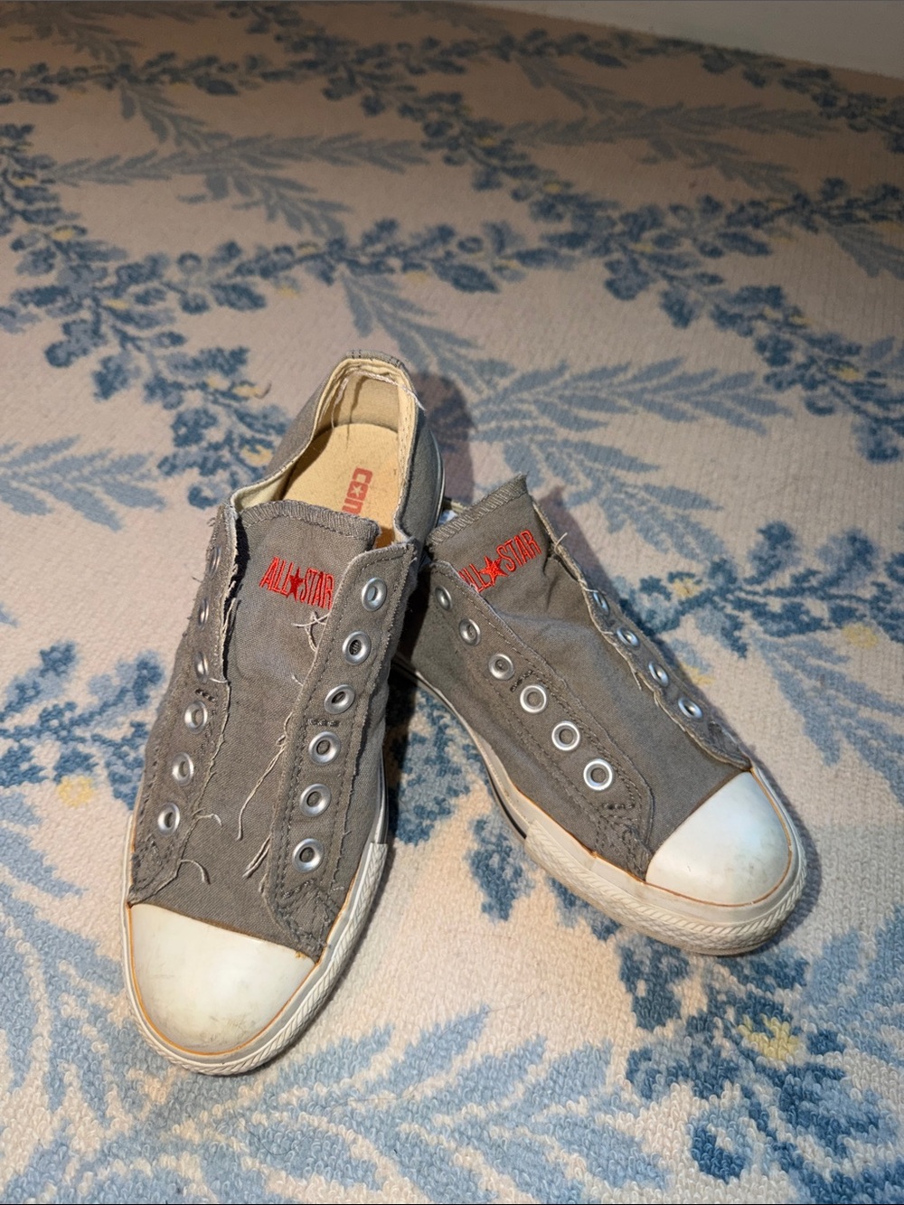 Converse Grey Canvas Slip-On Sneakers with Red Logo